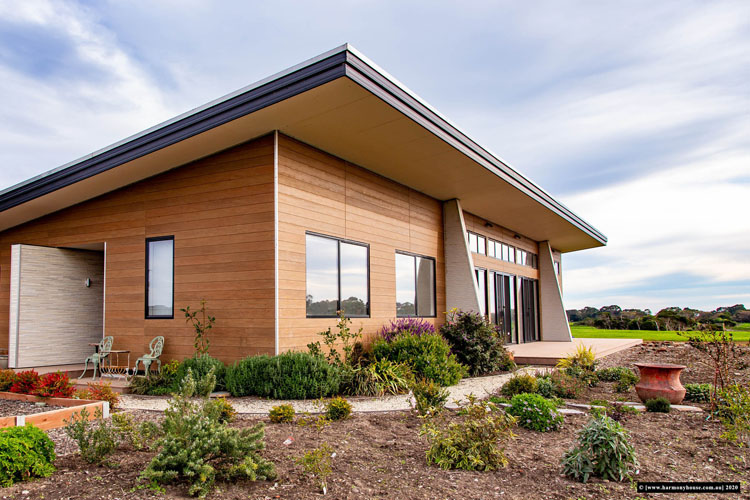 Image of east and north facing exterior of Harmony House. The home uses the free 'Banksia' Design For Place plan. 