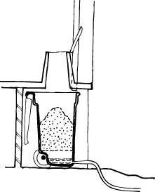 A cross-section schematic shows an owner-built wheelie-bin-based composting toilet. In this system, a wheelie bin sits below the toilet seat under the floor of a house. The wheelie bin can be replaced before it becomes full.
